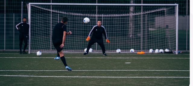Action sportive — football amateur